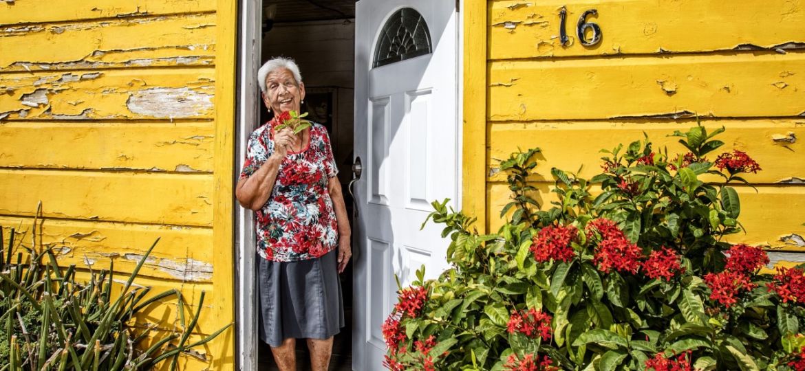 CS MAGGIO - Senior Citizen Standing in her Front Door
