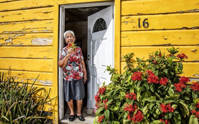 CS MAGGIO - Senior Citizen Standing in her Front Door